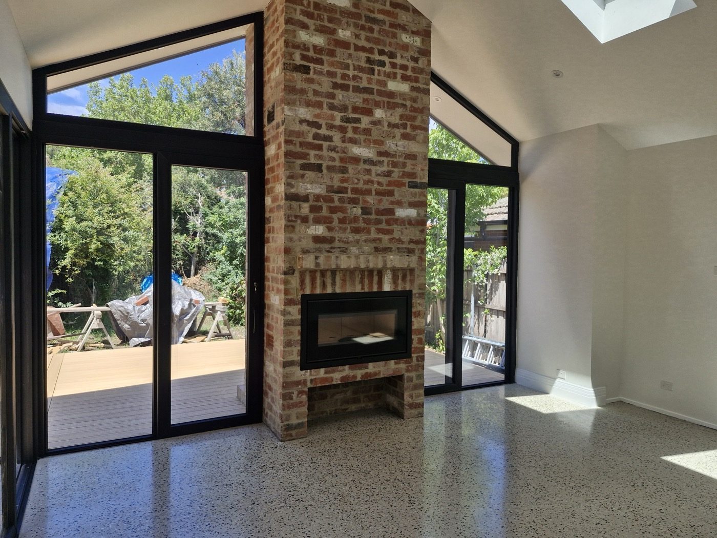 Detail of high-quality renovation work — custom joinery and stone benchtop